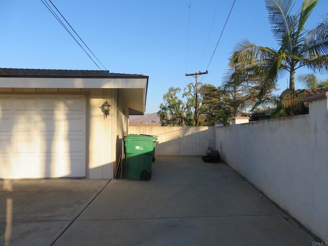 5629 Pray Ct, Bonita, CA 91902 - view of home's exterior featuring a garage and concrete driveway