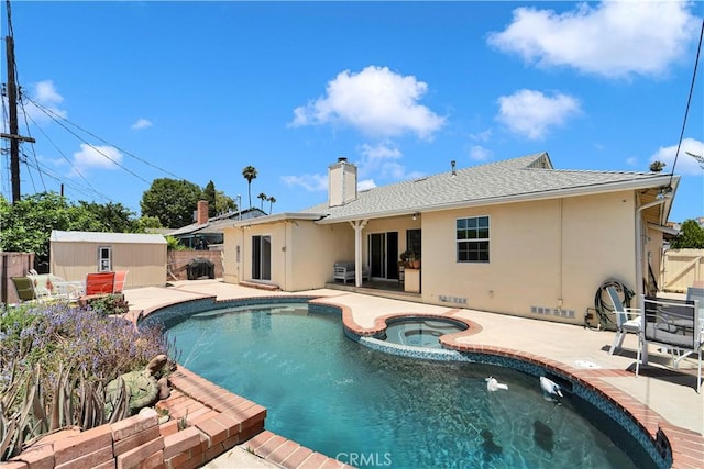 19140 Enadia, Reseda, CA 91335 - view of swimming pool with a patio area, a fenced backyard, a shed, and a pool with connected hot tub