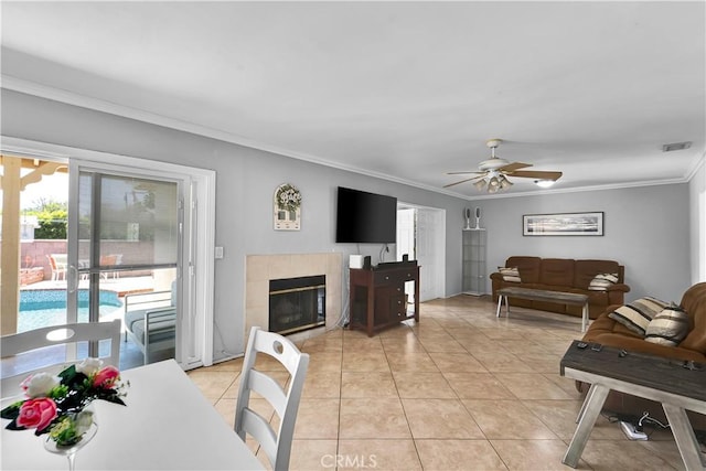 19140 Enadia, Reseda, CA 91335 - living area with crown molding, a ceiling fan, light tile patterned floors, and a tile fireplace