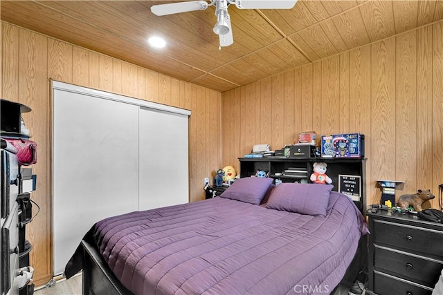 19140 Enadia, Reseda, CA 91335 - bedroom featuring wooden ceiling, a closet, wooden walls, and ceiling fan