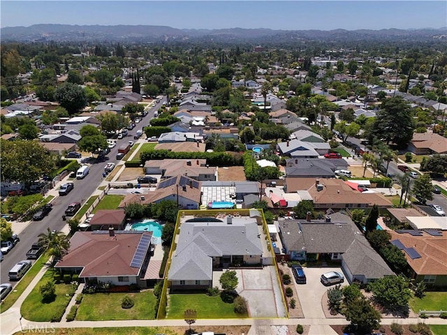 19140 Enadia, Reseda, CA 91335 - aerial view of property and surrounding area with property parcel outlined and nearby suburban area
