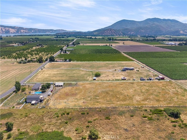 3155 Soda Bay Rd, Lakeport, CA 95453 - aerial view of sparsely populated area with large plots for crops and a mountain backdrop