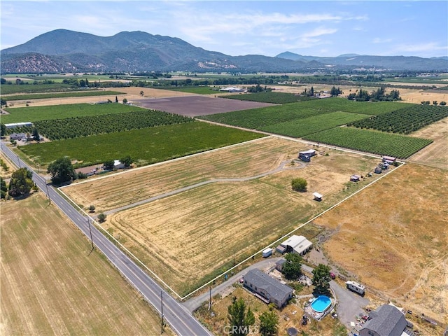 3155 Soda Bay Rd, Lakeport, CA 95453 - aerial view of sparsely populated area featuring rows of crops and a mountain backdrop