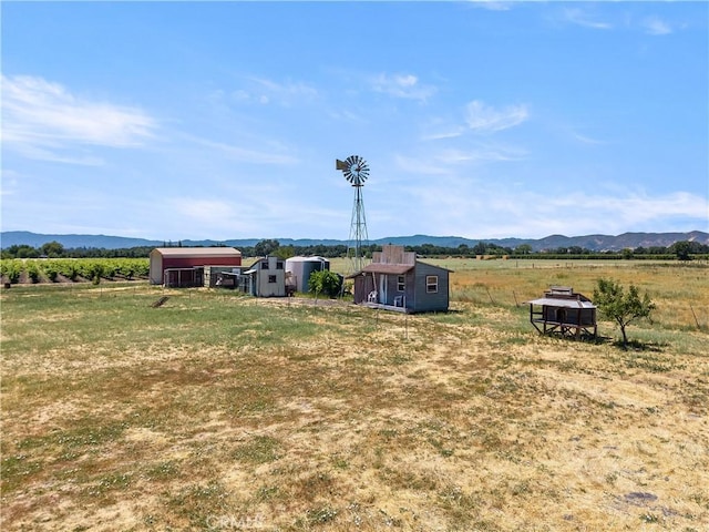 3155 Soda Bay Rd, Lakeport, CA 95453 - view of yard featuring a storage unit, a view of rural / pastoral area, and a mountain view