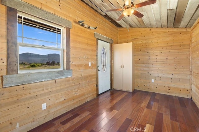 3155 Soda Bay Rd, Lakeport, CA 95453 - empty room with wood walls, dark wood-style flooring, ceiling fan, wooden ceiling, and a mountain view