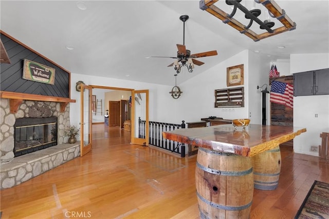 810 Oakmont Ln, Lake Arrowhead, CA 92352 - bar featuring a fireplace, vaulted ceiling, light wood-style flooring, ceiling fan, and recessed lighting