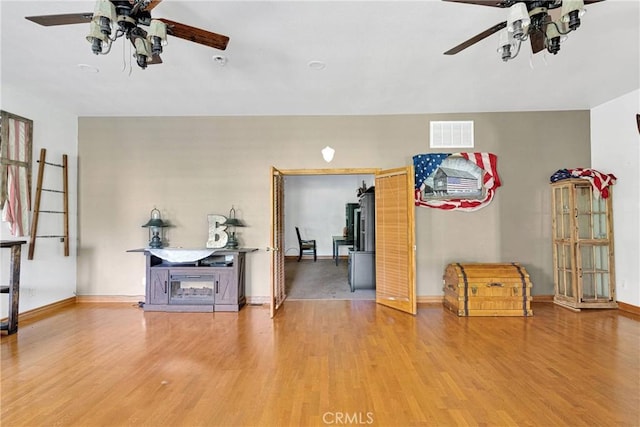 810 Oakmont Ln, Lake Arrowhead, CA 92352 - empty room with a ceiling fan and wood finished floors