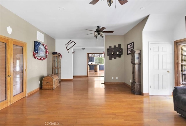 810 Oakmont Ln, Lake Arrowhead, CA 92352 - unfurnished living room with a ceiling fan and light wood-style floors