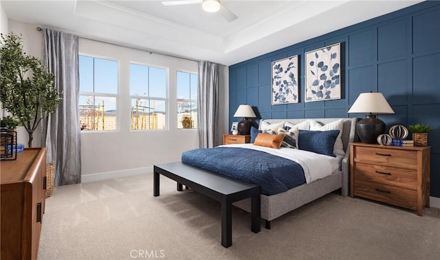 233 Carmelita Ln, Tehachapi, CA 93561 - bedroom featuring light colored carpet, a raised ceiling, and a ceiling fan