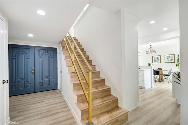 915 Bradish Ave, Glendora, CA 91740 - foyer entrance featuring stairs, light wood-style flooring, and recessed lighting