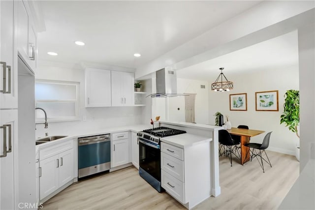 915 Bradish Ave, Glendora, CA 91740 - kitchen featuring appliances with stainless steel finishes, island exhaust hood, a peninsula, open shelves, and light wood-style flooring