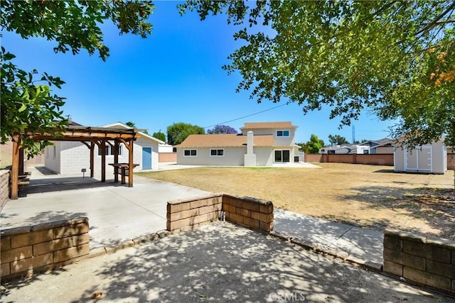 915 Bradish Ave, Glendora, CA 91740 - rear view of property with a patio, a gazebo, a shed, and stucco siding