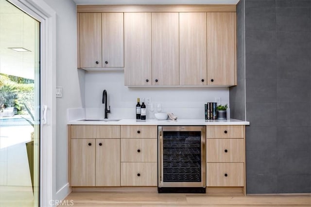 19625 Romar St, Northridge, CA 91324 - indoor dry bar featuring wine cooler and light wood finished floors