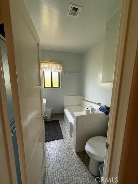 14594 Dyer St, Sylmar, CA 91342 - bathroom with a garden tub and tile patterned flooring