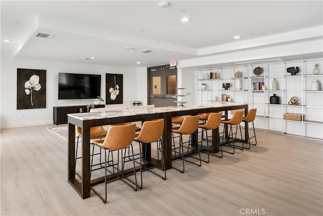 168 S Monterey St Unit 502, Alhambra, CA 91801 - bar featuring light wood-type flooring and recessed lighting