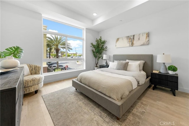 168 S Monterey St Unit 502, Alhambra, CA 91801 - bedroom with light wood-type flooring and recessed lighting