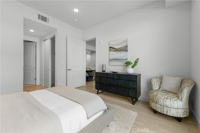 168 S Monterey St Unit 502, Alhambra, CA 91801 - bedroom featuring light wood-style flooring, recessed lighting, and a closet