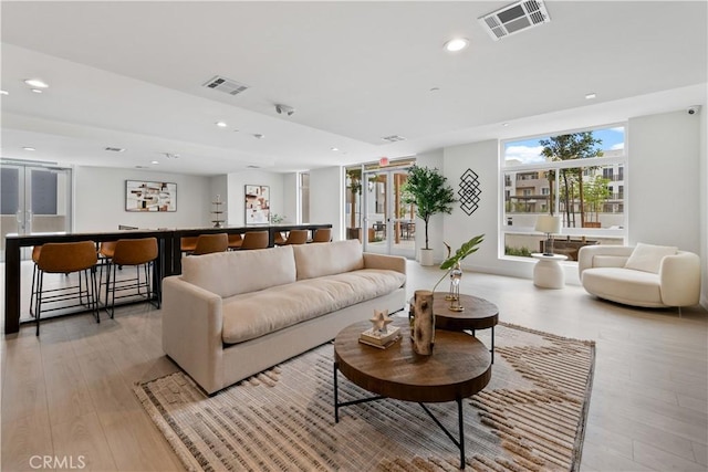 168 S Monterey St Unit 502, Alhambra, CA 91801 - living area featuring light wood-style flooring, recessed lighting, and french doors