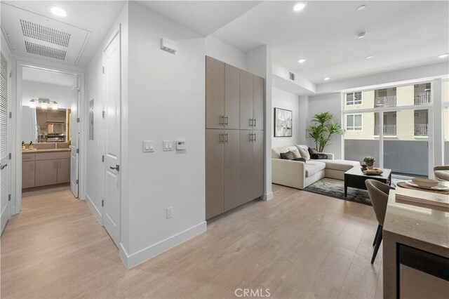 168 S Monterey St Unit 502, Alhambra, CA 91801 - hallway featuring light wood-type flooring and recessed lighting