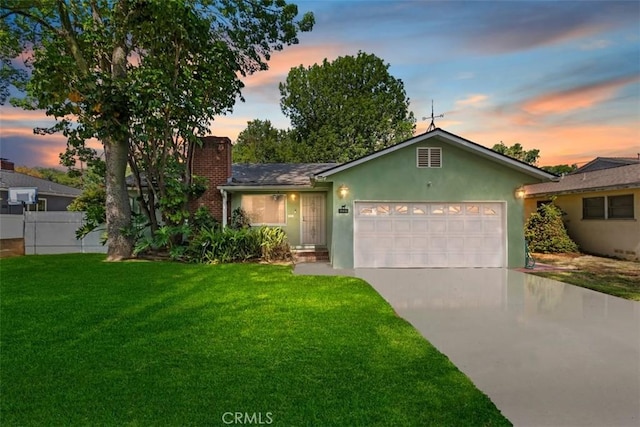 6699 Belinda Dr, Riverside, CA 92504 - ranch-style house with concrete driveway, a garage, stucco siding, and a chimney