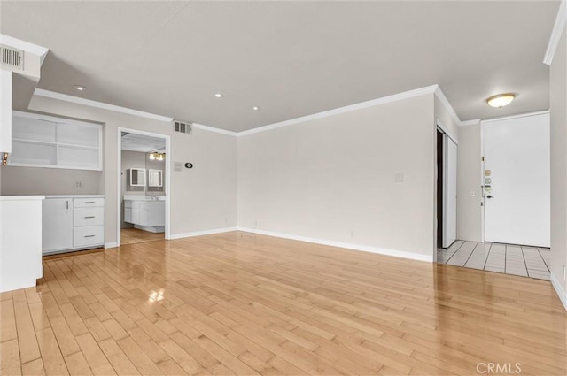 532 N Rossmore Ave Unit 411, Los Angeles, CA 90004 - unfurnished living room with light wood-type flooring, crown molding, and recessed lighting