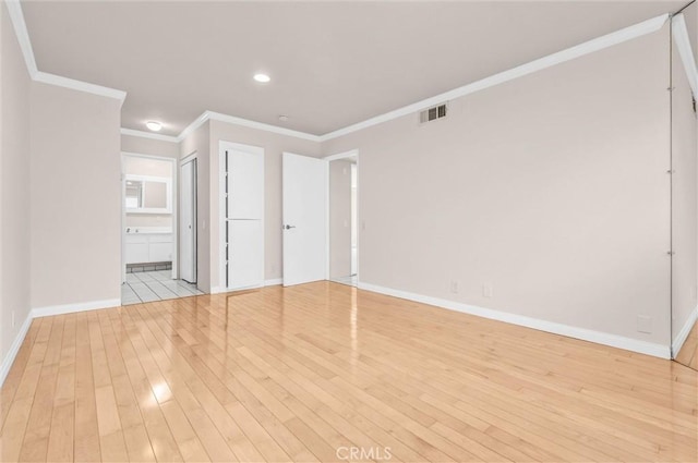 532 N Rossmore Ave Unit 411, Los Angeles, CA 90004 - unfurnished bedroom featuring light wood-style flooring, ornamental molding, recessed lighting, and ensuite bathroom