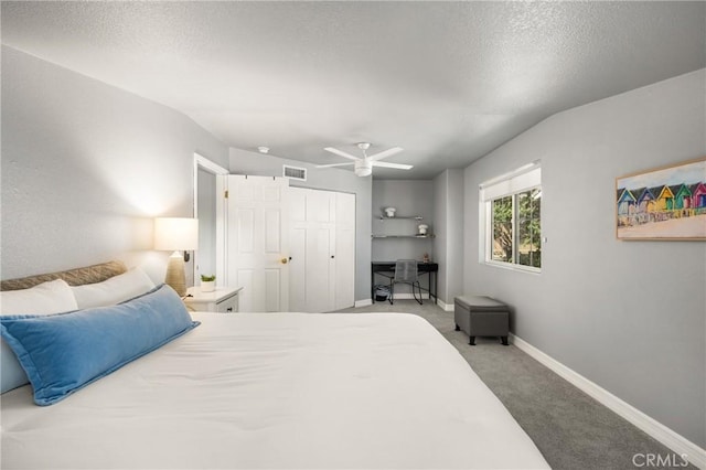 8507 E Heatherview Ln, Orange, CA 92869 - carpeted bedroom with a desk, a textured ceiling, a ceiling fan, and a closet