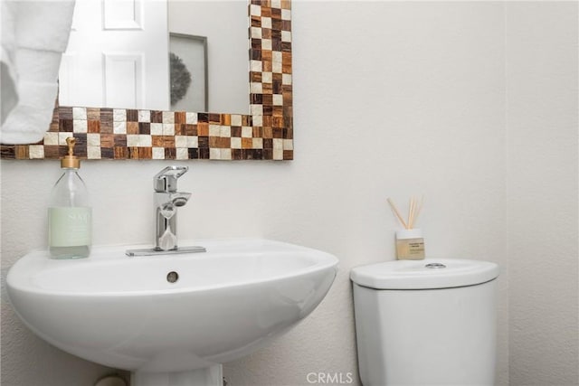 8507 E Heatherview Ln, Orange, CA 92869 - half bath with a sink and toilet
