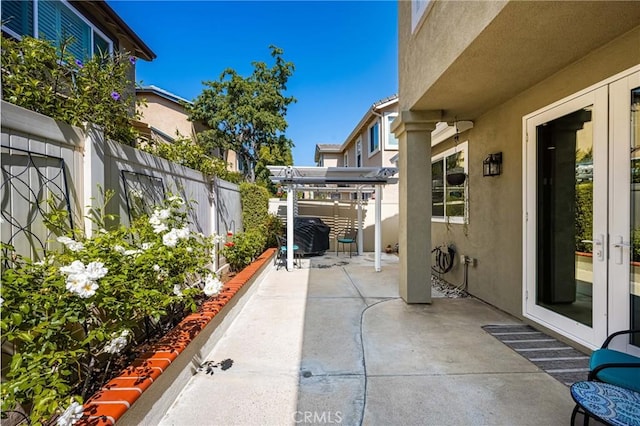 8507 E Heatherview Ln, Orange, CA 92869 - fenced backyard featuring french doors and a patio