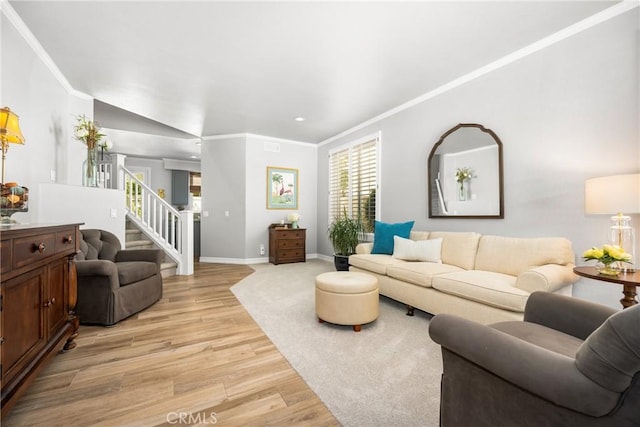 8507 E Heatherview Ln, Orange, CA 92869 - living room featuring light wood finished floors, stairway, ornamental molding, healthy amount of natural light, and recessed lighting