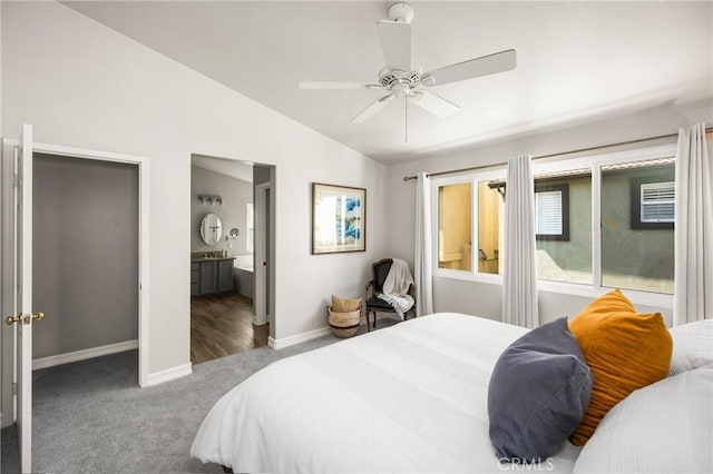 8507 E Heatherview Ln, Orange, CA 92869 - carpeted bedroom featuring lofted ceiling, connected bathroom, and a ceiling fan