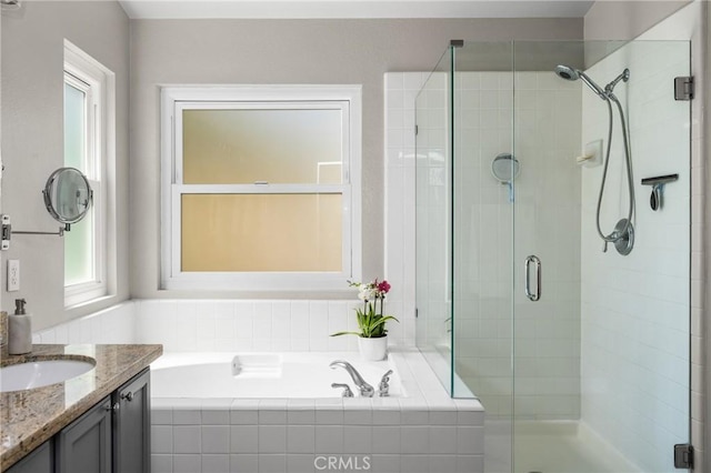 8507 E Heatherview Ln, Orange, CA 92869 - full bathroom featuring vanity, a stall shower, and a bath