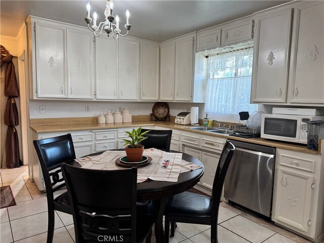 2064 E Campus Way, Hemet, CA 92544 - kitchen with dishwasher, white microwave, a chandelier, and light tile patterned floors