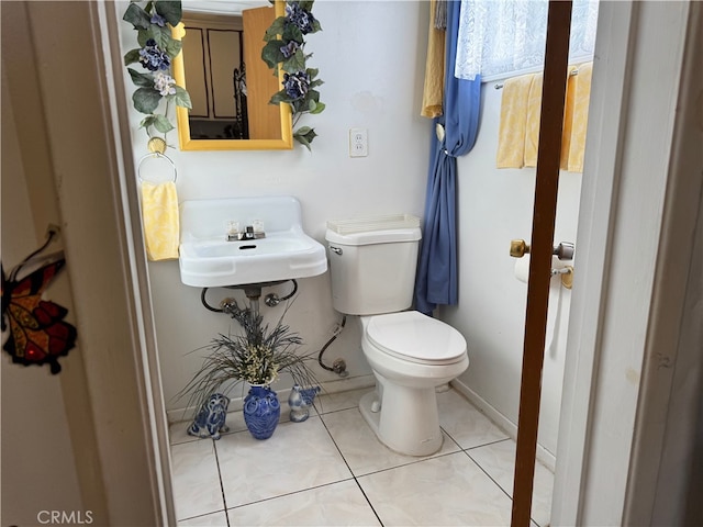 2064 E Campus Way, Hemet, CA 92544 - half bathroom with toilet and tile patterned floors