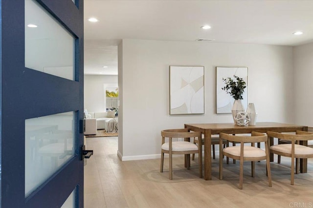 7911 Terraza Disoma, Carlsbad, CA 92009 - dining space with recessed lighting and light wood-style floors