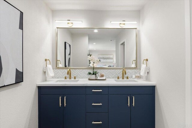 7911 Terraza Disoma, Carlsbad, CA 92009 - bathroom with backsplash and double vanity