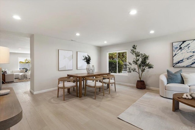 7911 Terraza Disoma, Carlsbad, CA 92009 - dining area featuring light wood-type flooring and recessed lighting