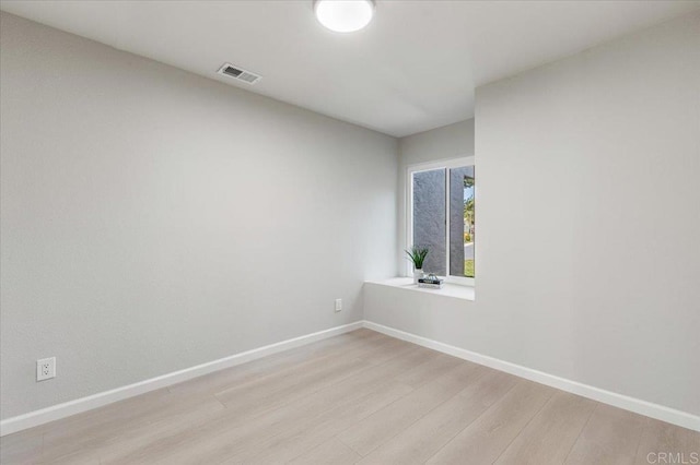 7911 Terraza Disoma, Carlsbad, CA 92009 - spare room with light wood finished floors and baseboards
