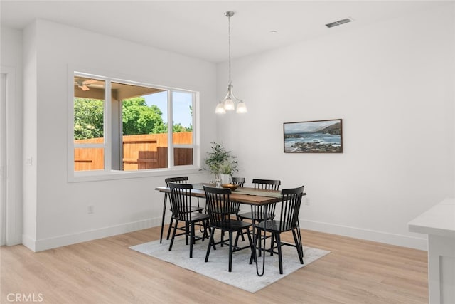 5 Gazania Ct, Chico, CA 95926 - dining area with wood finished floors and a chandelier