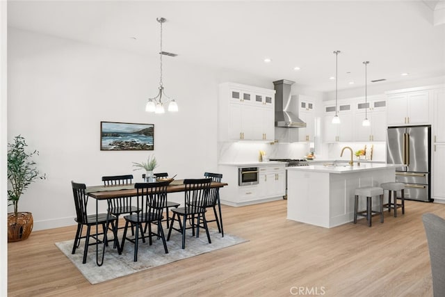 5 Gazania Ct, Chico, CA 95926 - dining area featuring light wood-style flooring, recessed lighting, and a chandelier