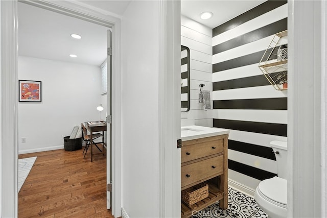 1967 Rolling Vista Dr Unit 58, Lomita, CA 90717 - half bath featuring vanity, wood finished floors, and recessed lighting