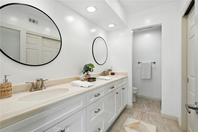 1967 Rolling Vista Dr Unit 58, Lomita, CA 90717 - bathroom with double vanity and recessed lighting