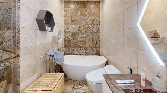 14569 Benefit St Unit 102, Sherman Oaks, CA 91403 - full bath with tile walls, a soaking tub, and vanity