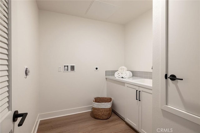 414 Main St Unit 430, Huntington Beach, CA 92648 - laundry area featuring hookup for an electric dryer, wood finished floors, cabinet space, and hookup for a washing machine