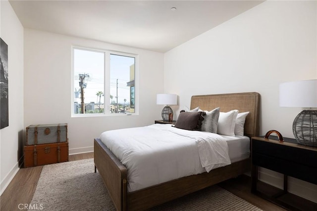 414 Main St Unit 430, Huntington Beach, CA 92648 - bedroom featuring wood finished floors and baseboards