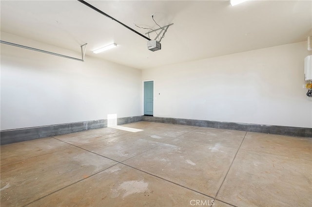 904 Waggoner Rd, Paradise, CA 95969 - garage featuring a garage door opener and baseboards