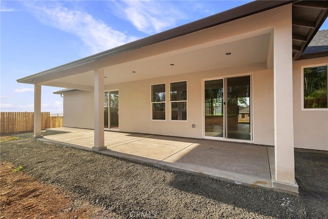 904 Waggoner Rd, Paradise, CA 95969 - back of house with stucco siding and a patio area