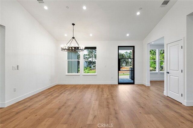 904 Waggoner Rd, Paradise, CA 95969 - unfurnished dining area featuring a chandelier, high vaulted ceiling, light wood-style floors, and recessed lighting