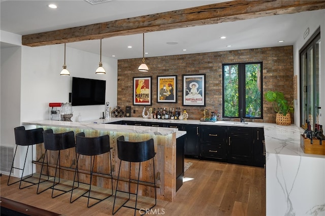 30671 Steeplechase Dr, San Juan Capistrano, CA 92675 - indoor wet bar with light wood-type flooring, recessed lighting, beamed ceiling, and hanging light fixtures