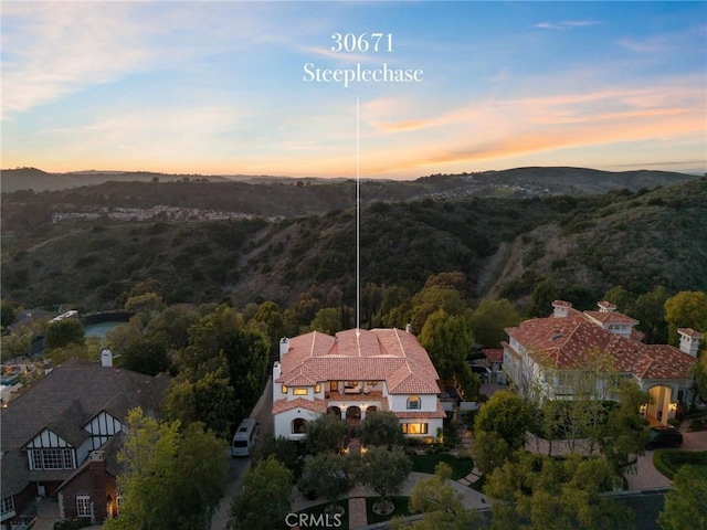 30671 Steeplechase Dr, San Juan Capistrano, CA 92675 - aerial view at dusk of a mountain view
